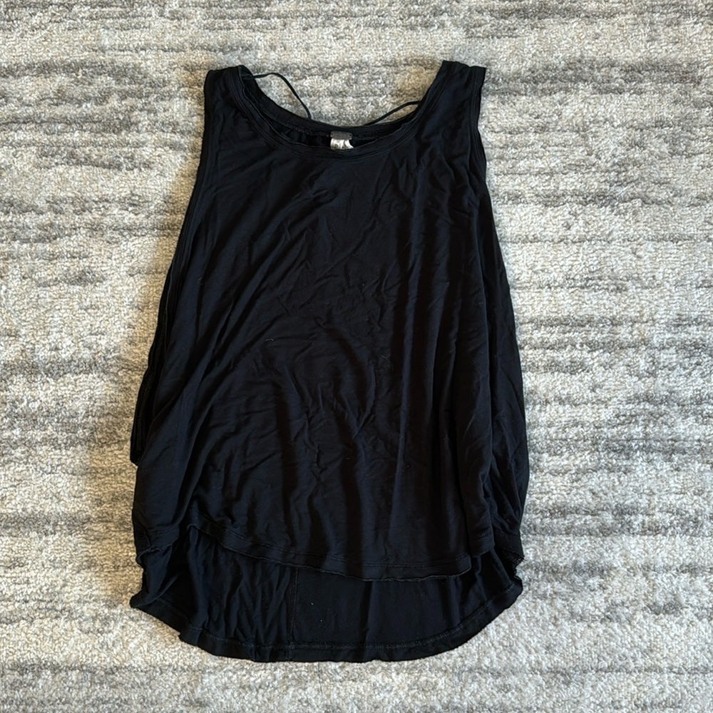 Black flowy shirt with large opening on sides